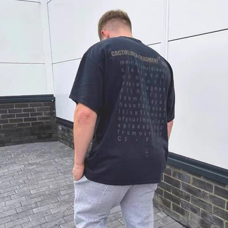 Mens T-shirt Vintage Kanye x Cactus Jack collaboration featuring Hiroshi Fujiwara's Fragment lightning bolt graphic.