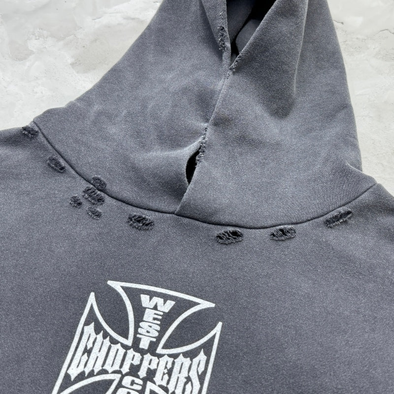 Unisex Vintage Hoodie Limited-edition distressed hooded sweatshirt featuring multi-zone handcrafted distressing details and a heavyweight fabric with an enzyme-washed, faded finish.