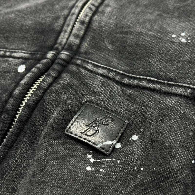 Unisex Vintage Hoodie Oversized, relaxed-fit layered outerwear; naturally faded, distressed wash finish; hand-applied ink splatter detailing; heavyweight pure cotton French terry fabric.