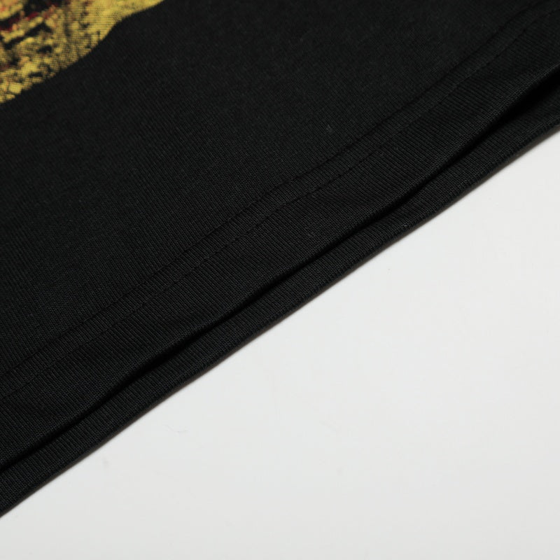 Vintage-style American T-shirt Worn Texture Sinister Smiley Design