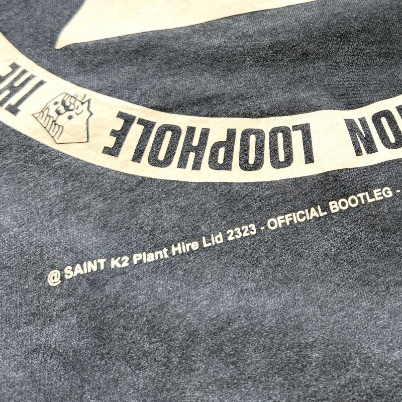 Unisex Vintage T Shirts Saint × KLF Freedom Radio Collaboration T-Shirt. Heavyweight 260g pure cotton fabric (post-wash weight). Vintage single-stitch and blind-stitch construction. Features hand-painted ink splatter, sandblasted wash finish, and dis
