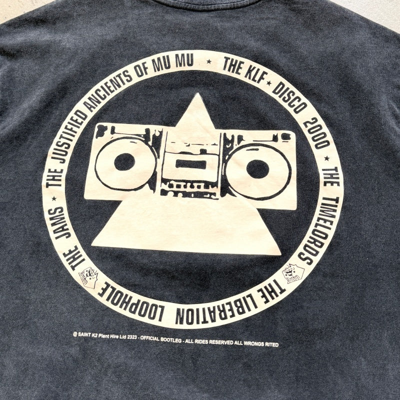 Unisex Vintage T Shirts Saint × KLF Freedom Radio Collaboration T-Shirt. Heavyweight 260g pure cotton fabric (post-wash weight). Vintage single-stitch and blind-stitch construction. Features hand-painted ink splatter, sandblasted wash finish, and dis