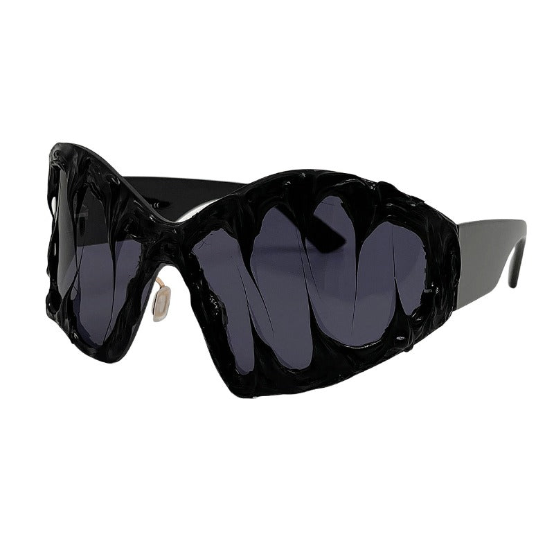 Trendy punk glasses alien shape