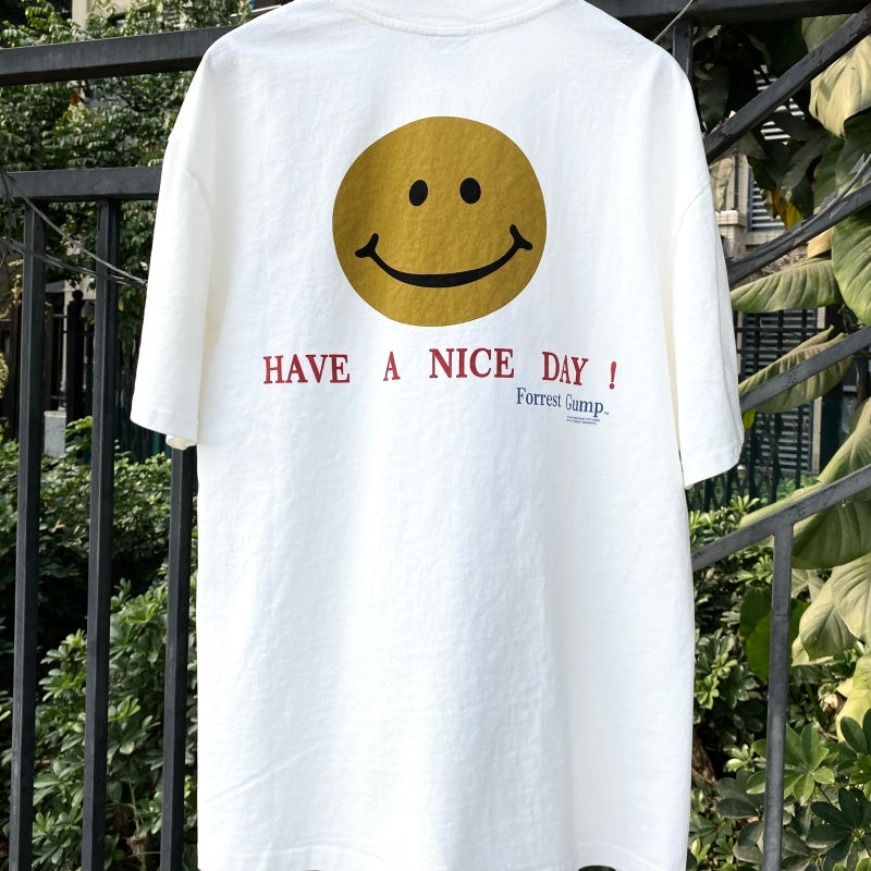Unisex Vintage T Shirts Have a nice day! â€?Limited-edition smiley face design featuring direct-to-garment white ink printing; vintage style with a heavyweight, washed, and distressed finish.