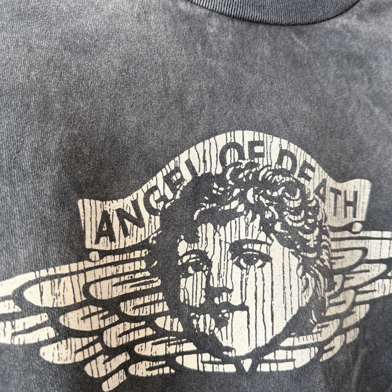 Unisex Vintage T Shirts Saint x Death Angel Little Angel Limited Edition. Crafted from heavyweight 100% cotton fabric (weighing 260g post-wash). Features vintage single-stitch construction (top and bottom hems), heavy-duty potassium spray and enzym