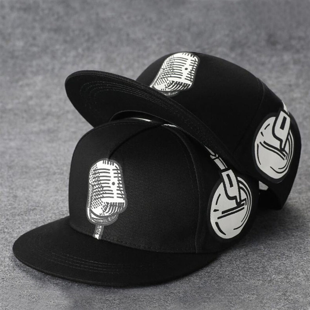 Trendy flat brimmed snapback hatsheadphone microphone shade