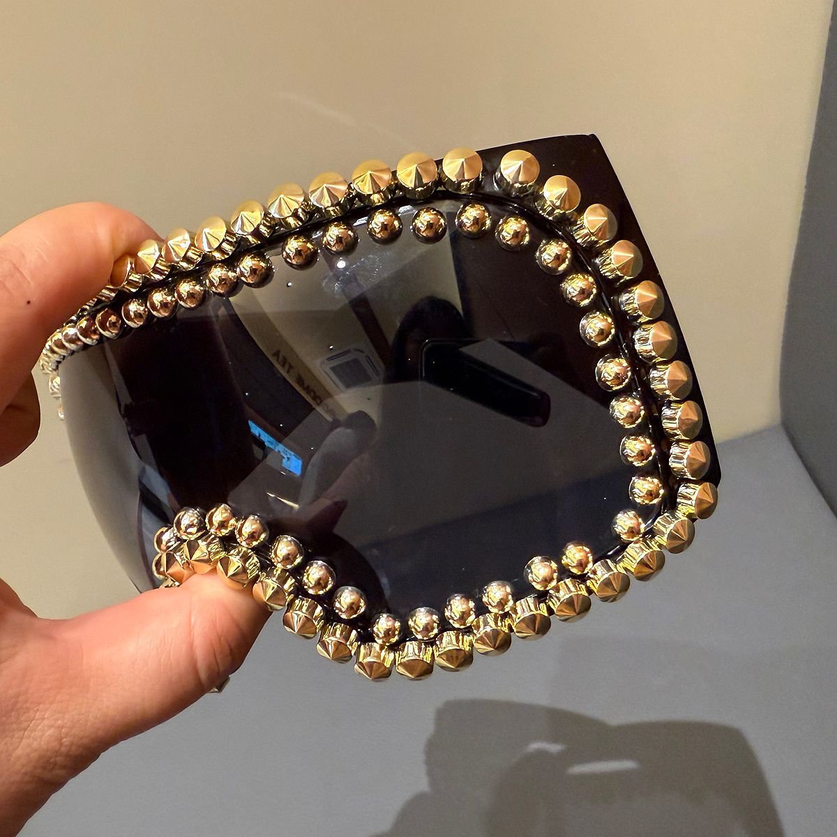 Trendy punk glasses full of diamonds and rivets