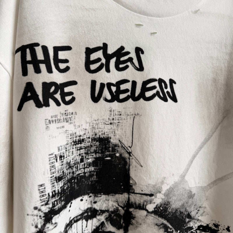 Unisex Vintage T Shirts Saint Street Dirty â€?A Follow Your Heart limited-edition tee featuring street graffiti aesthetics. Details include hand-painted dirty spray effects, multiple hand-distressed slash cuts, and a heavy-duty enzyme-washed fin