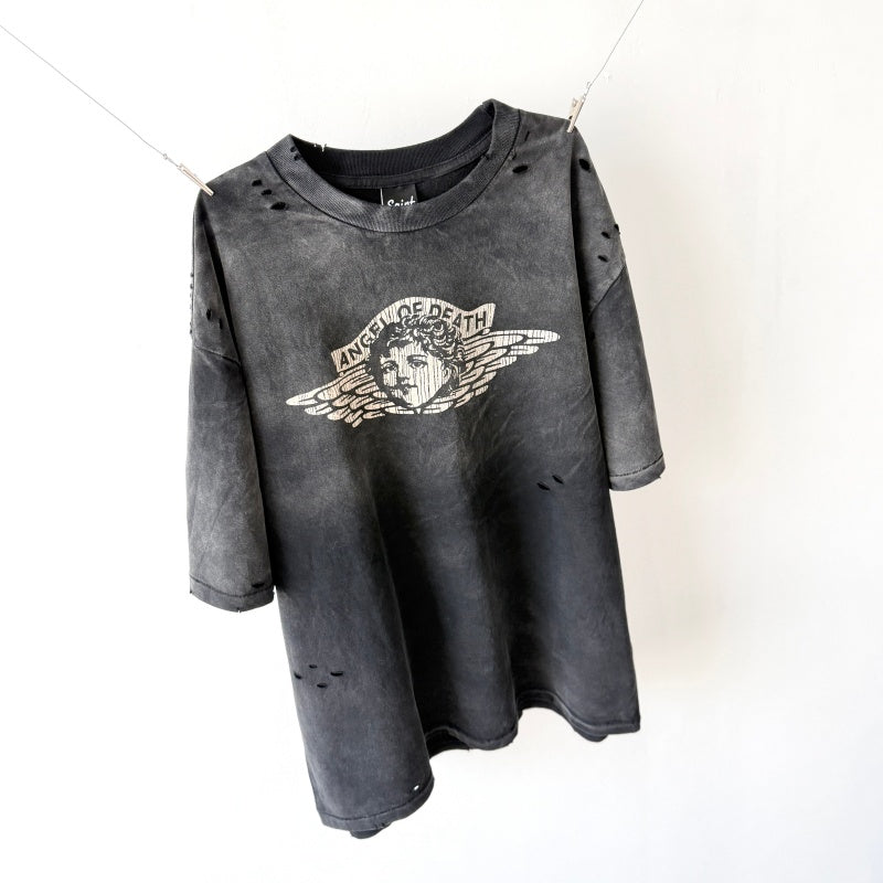 Unisex Vintage T Shirts Saint x Death Angel Little Angel Limited Edition. Crafted from heavyweight 100% cotton fabric (weighing 260g post-wash). Features vintage single-stitch construction (top and bottom hems), heavy-duty potassium spray and enzym