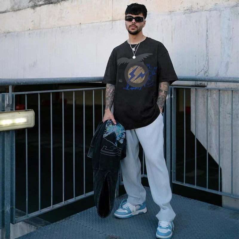 Mens T-shirt Vintage Kanye x Cactus Jack collaboration featuring Hiroshi Fujiwara's Fragment lightning bolt graphic.