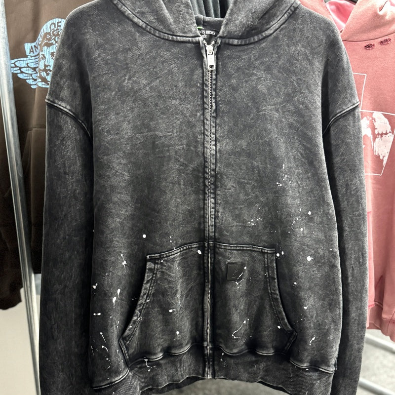 Unisex Vintage Hoodie Oversized, relaxed-fit layered outerwear; naturally faded, distressed wash finish; hand-applied ink splatter detailing; heavyweight pure cotton French terry fabric.