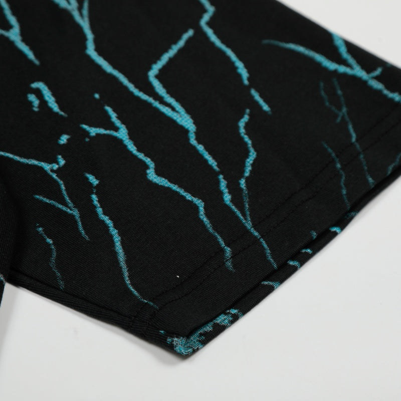Vintage-style American T-shirt Cracked Teal Lightning Human‑to‑Skull Print