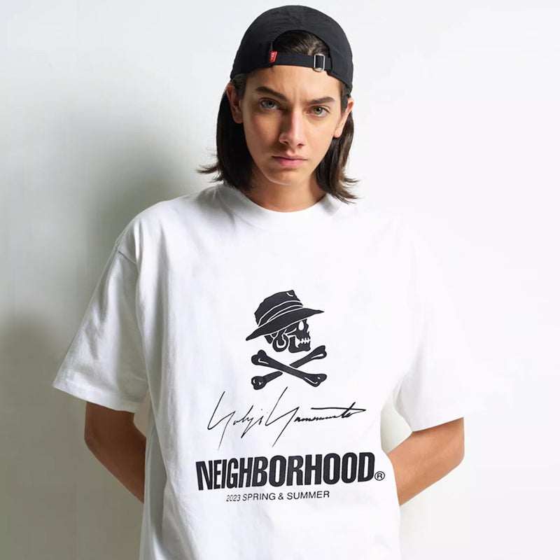 Mens T-shirt NBHD x Yohji Yamamoto collaboration featuring a signature slogan print.