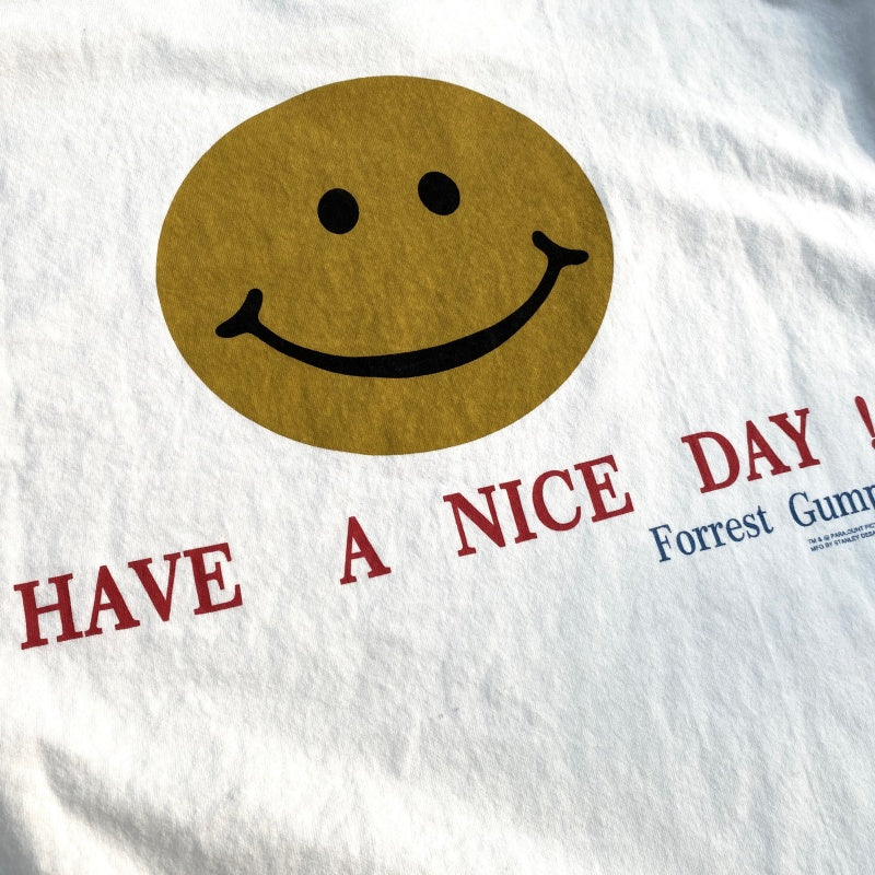 Unisex Vintage T Shirts Have a nice day! â€?Limited-edition smiley face design featuring direct-to-garment white ink printing; vintage style with a heavyweight, washed, and distressed finish.