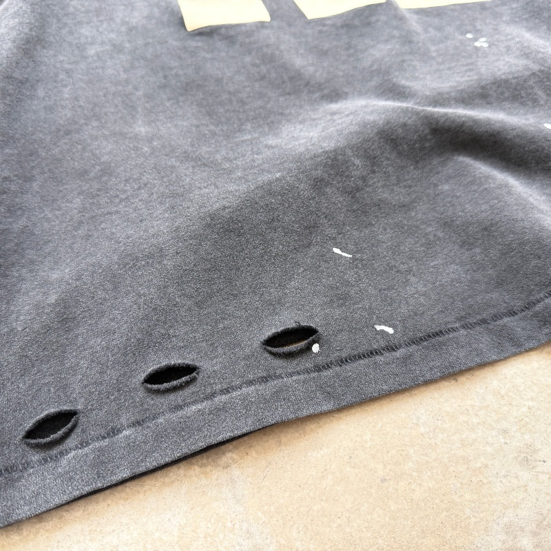 Unisex Vintage T Shirts Saint × KLF Freedom Radio Collaboration T-Shirt. Heavyweight 260g pure cotton fabric (post-wash weight). Vintage single-stitch and blind-stitch construction. Features hand-painted ink splatter, sandblasted wash finish, and dis