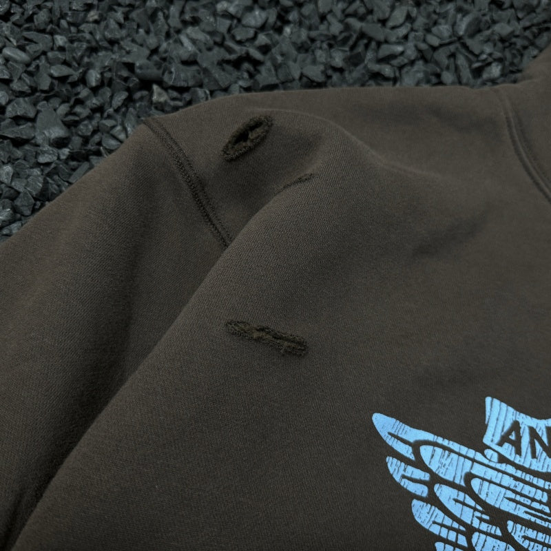 Unisex Vintage HoodieLittle Angel Exclusive â€?Vintage American-style hooded sweatshirt featuring a washed, distressed finish, handcrafted distressing details, a brushed texture, and a fleece-lined interior.