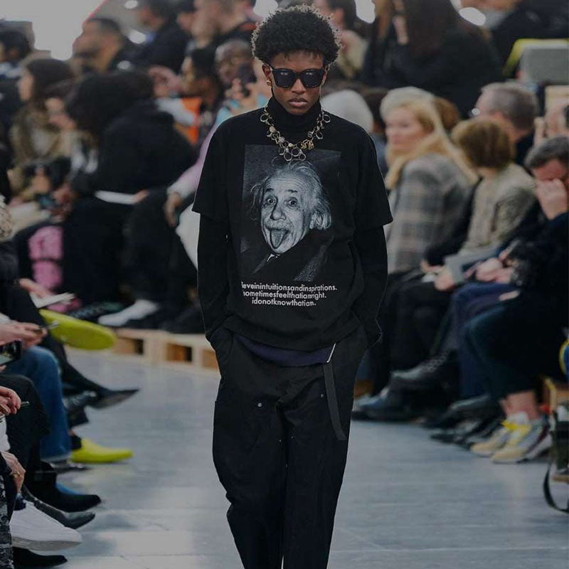 Mens T-shirt Vintage Trendy streetwear/hip-hop style: Einstein sticking out his tongue in a playful, quirky manner.