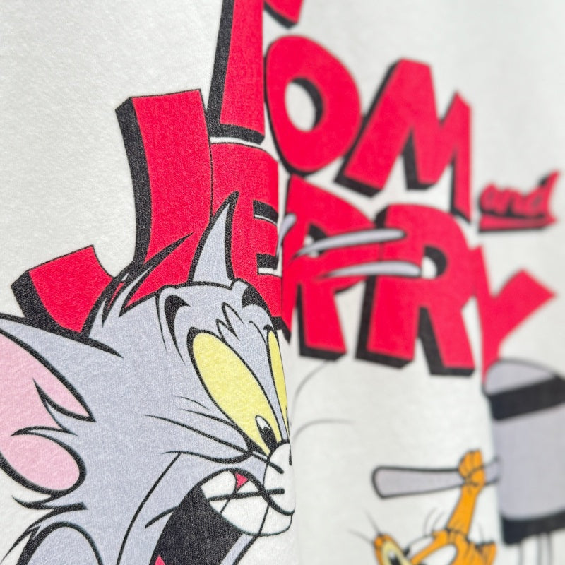 Unisex Vintage T Shirts TOM AND JERRY Limited Edition Washed & Distressed Short-Sleeve T-Shirt. Features custom heavyweight, brushed fabric with a vintage feel and high-quality direct-to-garment (white ink) printing—delivering premium texture and sty